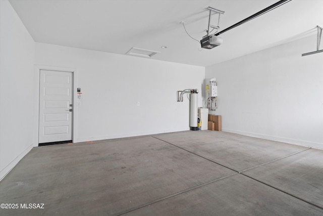 12767 E Giada Dr, Vail, AZ 85641 - garage with a garage door opener and water heater
