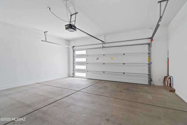 12767 E Giada Dr, Vail, AZ 85641 - garage featuring a garage door opener and baseboards
