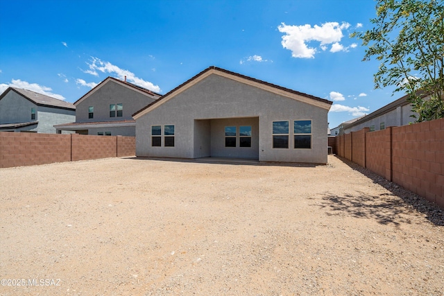 12767 E Giada Dr, Vail, AZ 85641 - rear view of property with stucco siding and a fenced backyard