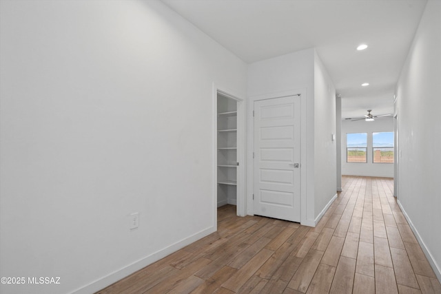 12767 E Giada Dr, Vail, AZ 85641 - corridor featuring light wood-style flooring, recessed lighting, and baseboards