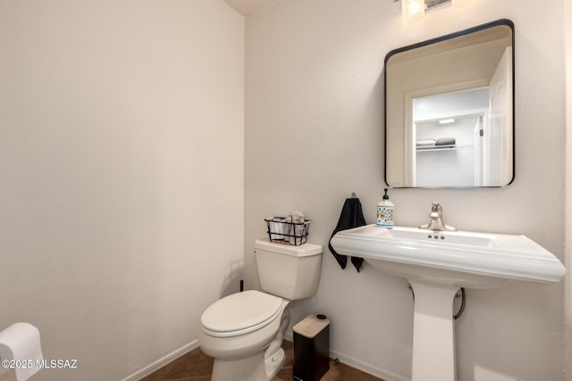 7397 W Crimson Ridge Dr, Marana, AZ 85743 - half bathroom with toilet and baseboards