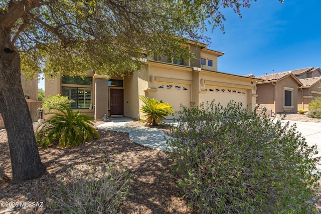 7397 W Crimson Ridge Dr, Marana, AZ 85743 - view of front facade with stucco siding, a tiled roof, a garage, and driveway