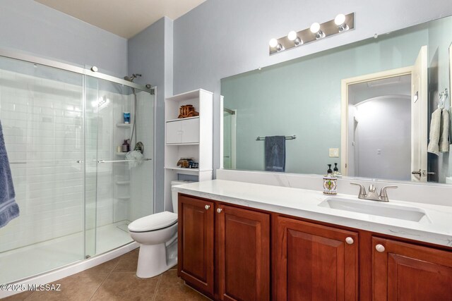 7397 W Crimson Ridge Dr, Marana, AZ 85743 - bathroom featuring a stall shower, tile patterned floors, and vanity