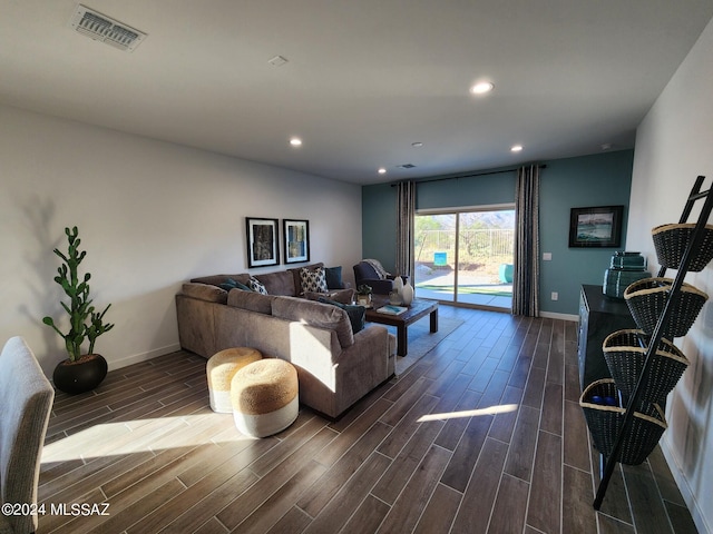 14139 E Canidae Dr E, Vail, AZ 85641 - living room with dark wood finished floors, baseboards, and recessed lighting