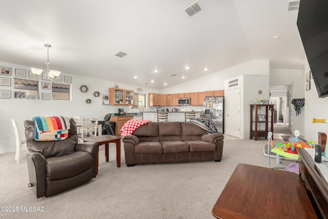 217 E Creosote Draw Rd, Vail, AZ 85641 - living room featuring light colored carpet, a chandelier, lofted ceiling, and recessed lighting
