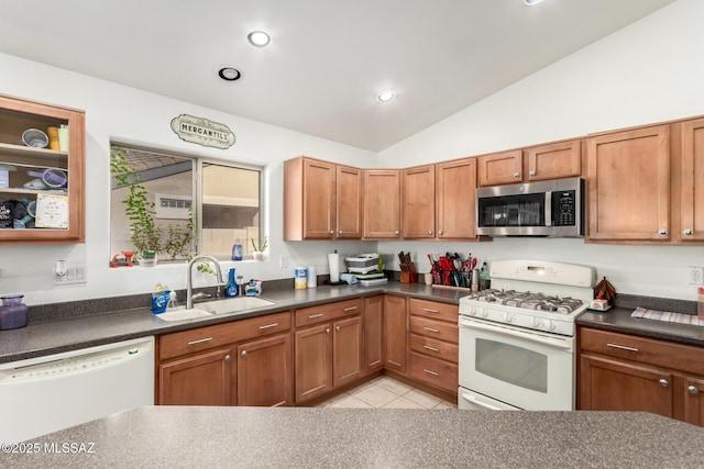 217 E Creosote Draw Rd, Vail, AZ 85641 - kitchen with white appliances, a sink, dark countertops, recessed lighting, and lofted ceiling