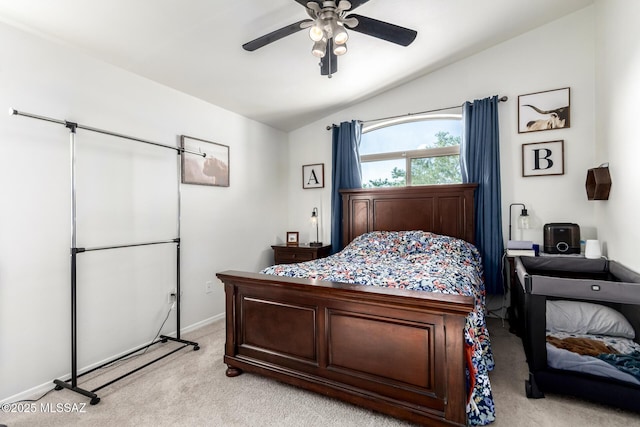 217 E Creosote Draw Rd, Vail, AZ 85641 - bedroom featuring vaulted ceiling, light carpet, baseboards, and a ceiling fan