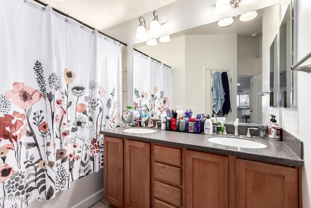 217 E Creosote Draw Rd, Vail, AZ 85641 - bathroom with double vanity and a shower with curtain