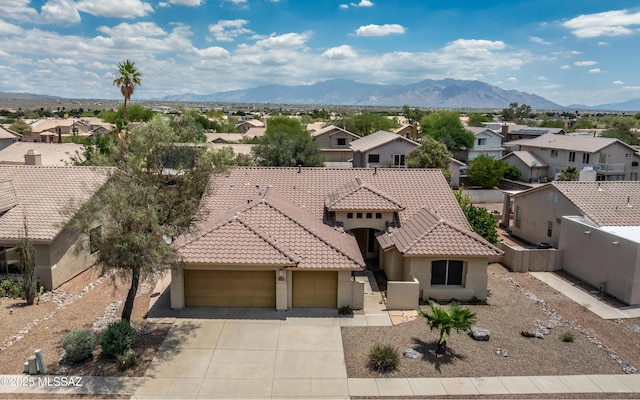 8892 N Silver Moon Way, Tucson, AZ 85743 - view of front of property with a residential view, a garage, stucco siding, and a tile roof