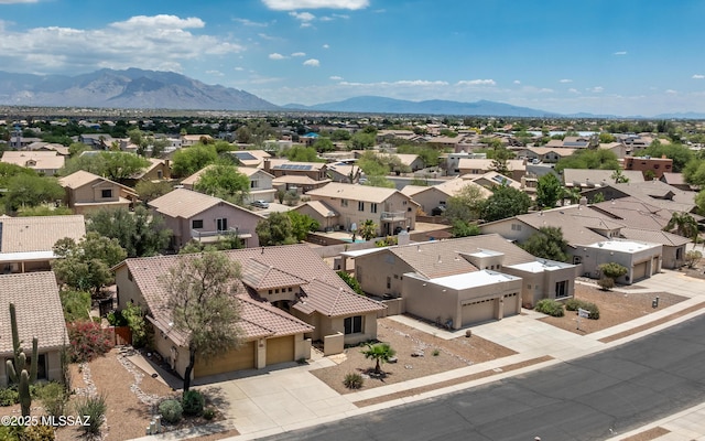 8892 N Silver Moon Way, Tucson, AZ 85743 - aerial perspective of suburban area with a mountain backdrop