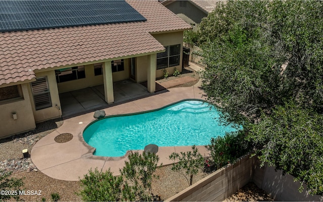 8892 N Silver Moon Way, Tucson, AZ 85743 - view of swimming pool featuring a patio and a fenced backyard