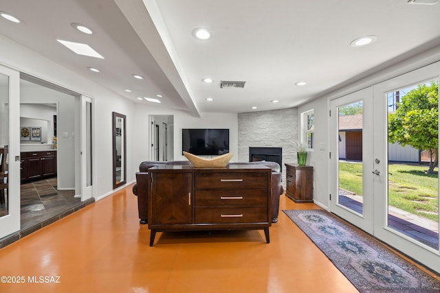 3357 N Christmas Ave, Tucson, AZ 85716 - living area with french doors, recessed lighting, a large fireplace, and baseboards
