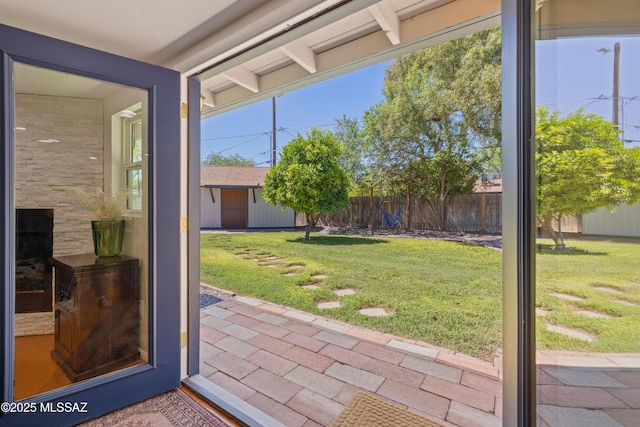 3357 N Christmas Ave, Tucson, AZ 85716 - doorway to outside featuring beamed ceiling