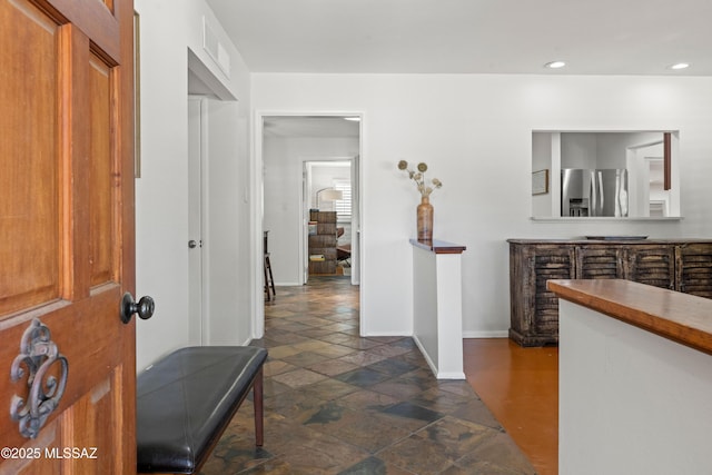3357 N Christmas Ave, Tucson, AZ 85716 - corridor with stone tile flooring, baseboards, and recessed lighting