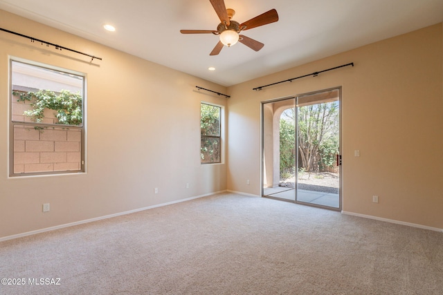 3259 E Corte Doce Palomas, Tucson, AZ 85718 - spare room with carpet, a ceiling fan, baseboards, and recessed lighting