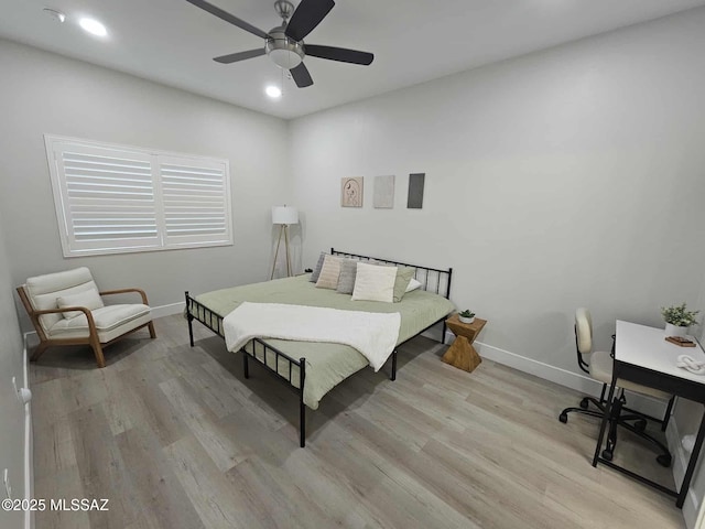 2020 E River Rd Unit 205, Tucson, AZ 85718 - bedroom featuring wood finished floors, baseboards, recessed lighting, and a ceiling fan