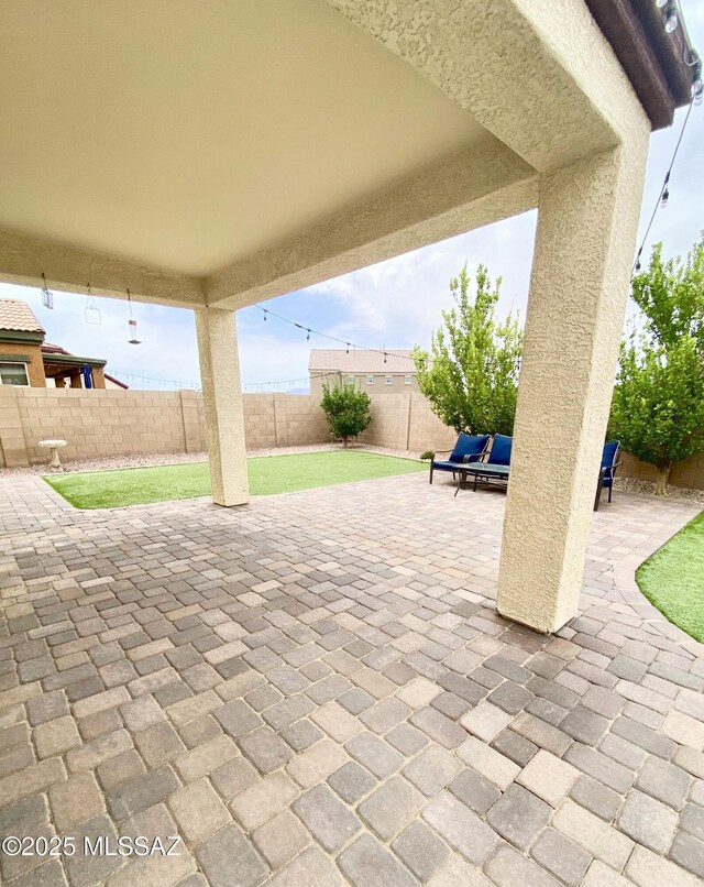 9828 N Niobrara Way, Tucson, AZ 85742 - fenced backyard with a patio
