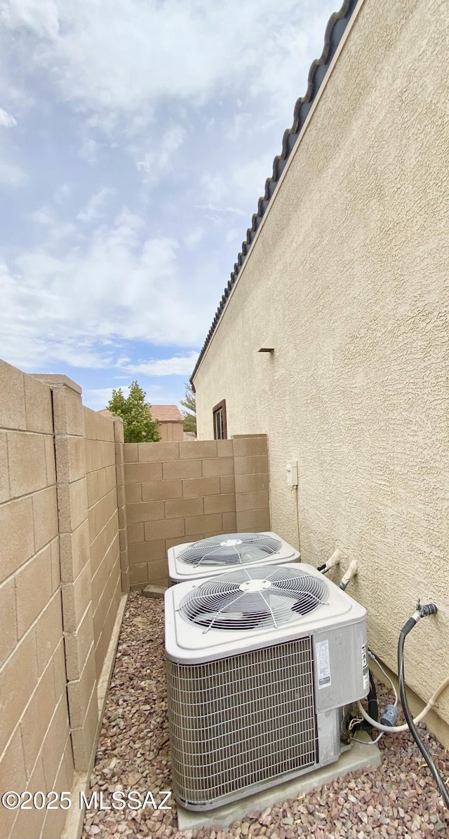 9828 N Niobrara Way, Tucson, AZ 85742 - exterior view of cooling unit and stucco siding