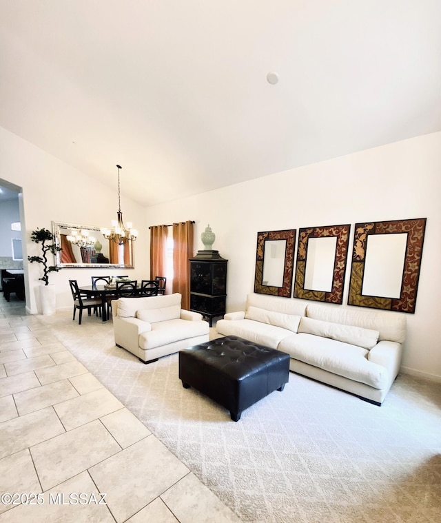 9828 N Niobrara Way, Tucson, AZ 85742 - living area featuring a chandelier, vaulted ceiling, and light tile patterned floors
