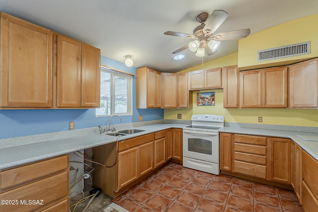 7821 N Jensen Dr, Tucson, AZ 85741 - kitchen featuring white range with electric stovetop, vaulted ceiling, a ceiling fan, light countertops, and light brown cabinetry