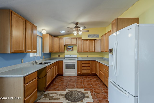 7821 N Jensen Dr, Tucson, AZ 85741 - kitchen featuring white appliances, a ceiling fan, light countertops, vaulted ceiling, and dark tile patterned floors