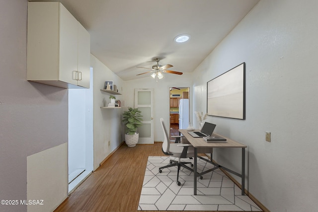 7821 N Jensen Dr, Tucson, AZ 85741 - office area with ceiling fan, light wood-style floors, and lofted ceiling