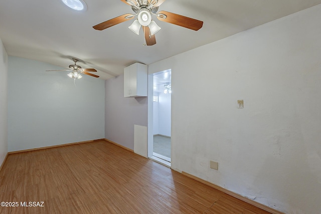 7821 N Jensen Dr, Tucson, AZ 85741 - unfurnished room featuring light wood-style flooring and a ceiling fan