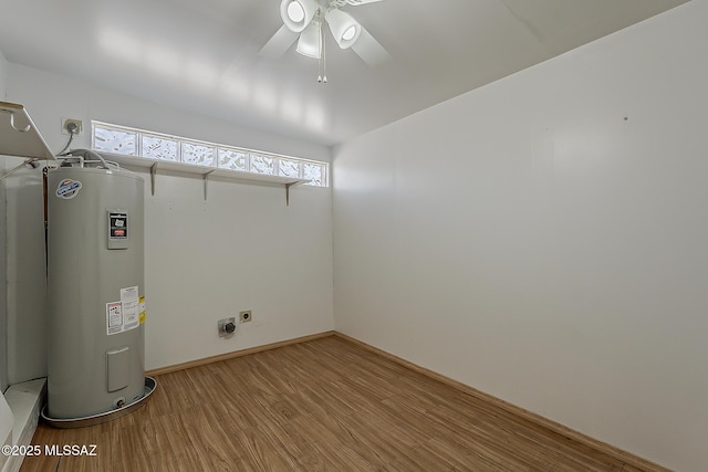 7821 N Jensen Dr, Tucson, AZ 85741 - laundry room with electric water heater, electric dryer hookup, ceiling fan, and light wood-type flooring