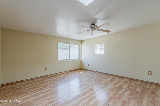 7821 N Jensen Dr, Tucson, AZ 85741 - spare room with light wood-type flooring and a ceiling fan
