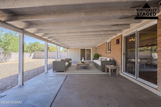 7821 N Jensen Dr, Tucson, AZ 85741 - fenced backyard featuring an outdoor living space and a patio area