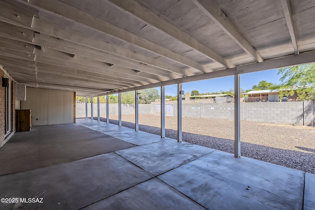 7821 N Jensen Dr, Tucson, AZ 85741 - fenced backyard with a patio area and a carport