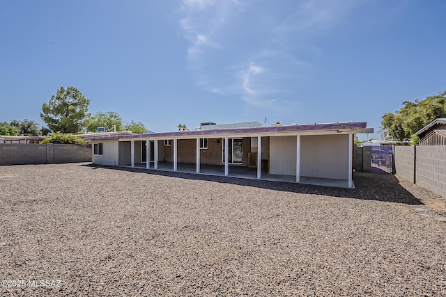 7821 N Jensen Dr, Tucson, AZ 85741 - rear view of property with a patio area and a fenced backyard