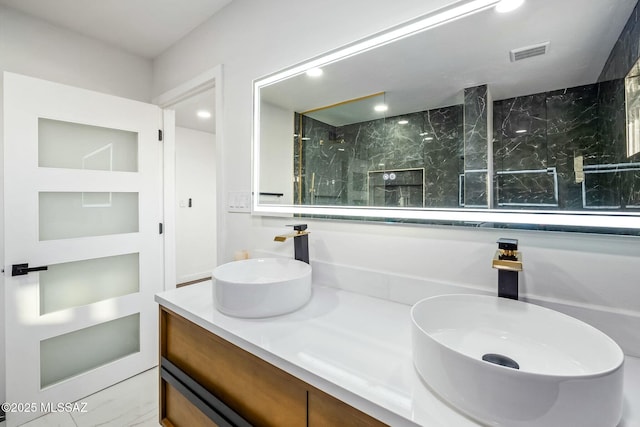 4939 E River Rd, Tucson, AZ 85718 - full bath featuring double vanity and recessed lighting