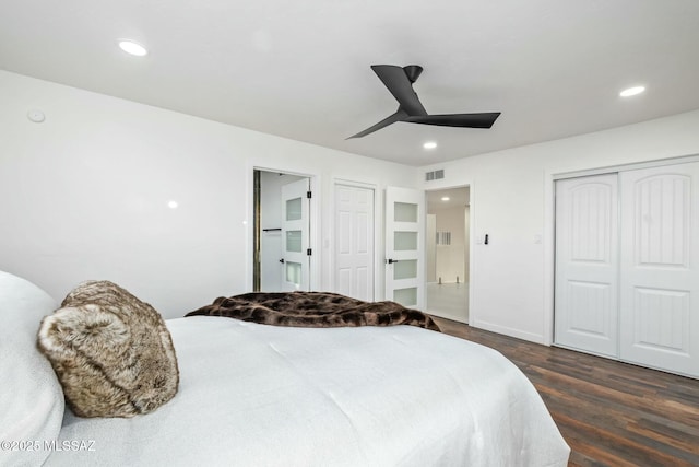 4939 E River Rd, Tucson, AZ 85718 - bedroom with dark wood-style flooring, recessed lighting, ceiling fan, a closet, and baseboards