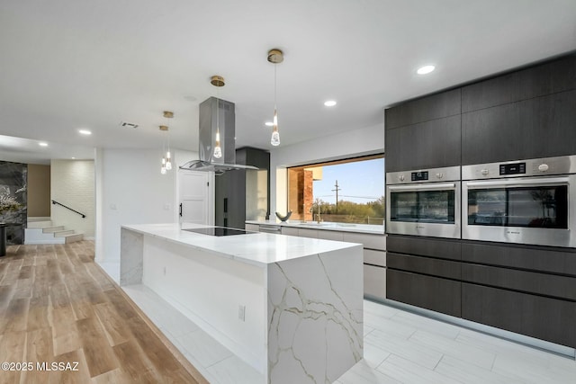 4939 E River Rd, Tucson, AZ 85718 - kitchen featuring island range hood, stainless steel oven, a spacious island, black electric cooktop, and recessed lighting