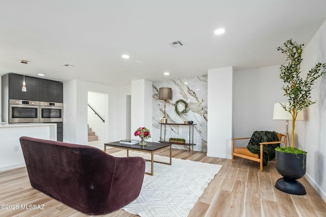 4939 E River Rd, Tucson, AZ 85718 - living area featuring stairs, recessed lighting, light wood finished floors, and baseboards