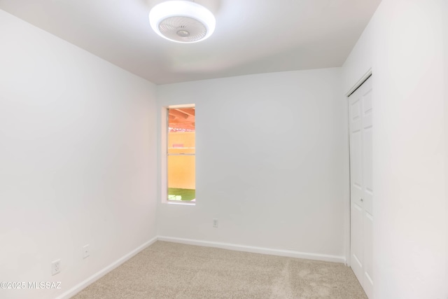 6255 N Camino Pimeria Alta Apt 81, Tucson, AZ 85718 - carpeted empty room featuring baseboards