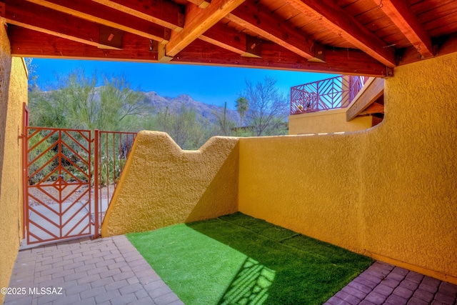 6255 N Camino Pimeria Alta Apt 81, Tucson, AZ 85718 - view of yard with a mountain view and a gate