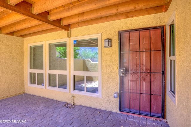 6255 N Camino Pimeria Alta Apt 65, Tucson, AZ 85718 - entrance to property featuring stucco siding and a patio area