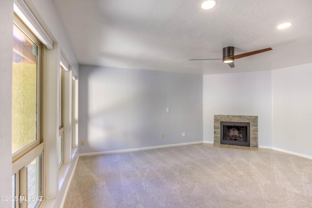 6255 N Camino Pimeria Alta Apt 65, Tucson, AZ 85718 - unfurnished living room with carpet floors, recessed lighting, baseboards, and ceiling fan