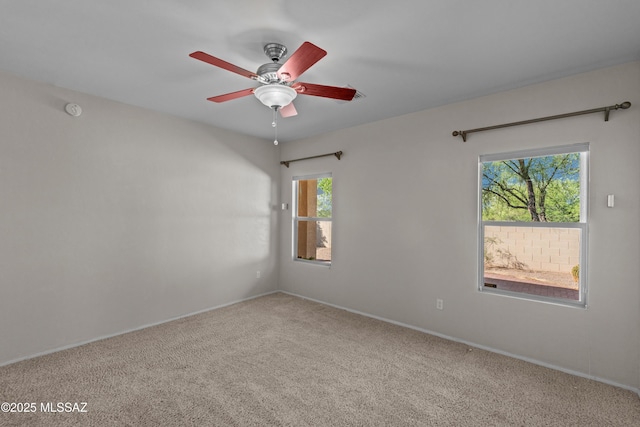 1248 W Via Cerro Colorado, Sahuarita, AZ 85629 - empty room with carpet, a ceiling fan, a smoke detector, and baseboards