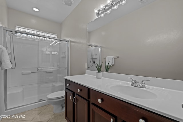 1248 W Via Cerro Colorado, Sahuarita, AZ 85629 - bathroom with toilet, vanity, tile patterned floors, and a stall shower