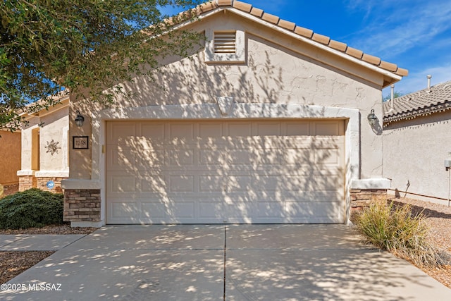 1248 W Via Cerro Colorado, Sahuarita, AZ 85629 - view of front of home with an attached garage, a tiled roof, and driveway