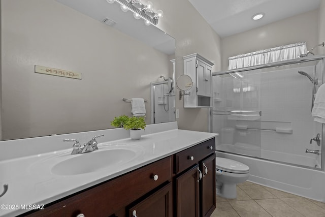 1248 W Via Cerro Colorado, Sahuarita, AZ 85629 - bathroom with toilet, vanity, tile patterned flooring, and combined bath / shower with glass door