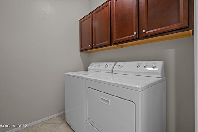 1248 W Via Cerro Colorado, Sahuarita, AZ 85629 - washroom featuring separate washer and dryer, cabinet space, light tile patterned floors, and baseboards