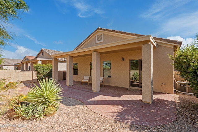 1248 W Via Cerro Colorado, Sahuarita, AZ 85629 - rear view of property with stucco siding, a patio, and cooling unit