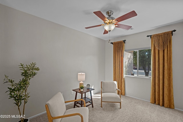 1248 W Via Cerro Colorado, Sahuarita, AZ 85629 - living area featuring carpet floors, baseboards, and a ceiling fan
