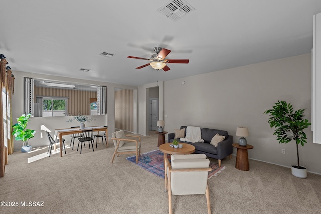 1248 W Via Cerro Colorado, Sahuarita, AZ 85629 - living area with carpet floors, ceiling fan, and baseboards
