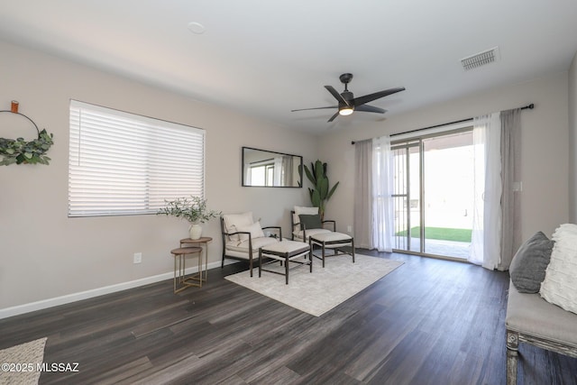 Tucson, AZ 85748 - living area with ceiling fan, dark wood-style floors, and baseboards