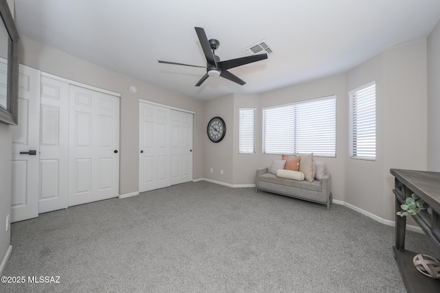 Tucson, AZ 85748 - living area with a ceiling fan, carpet, and baseboards